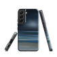 Dark abstract phone case with blue and grey streaks and glossy finish.