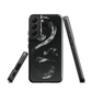 Phone case with detailed black python design on dark background.