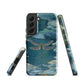 Nature-inspired phone case featuring a dragonfly over calm water with blue and green forest tones.