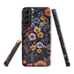Phone case with colourful wildflowers on dark background, floral art design
