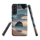 Phone case with Cathedral Cove beach and sunset scene, featuring soft skies and sea stack, by NZ artist Ben Hart.