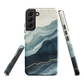 An elegant abstract phone case inspired by layered coastal forms in blue and teal tones.
