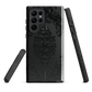 Black embossed damask phone case with gothic baroque pattern.