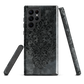 Dark damask patterned phone case with a vintage gothic aesthetic and textured stone background.