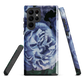 Designer phone case with a bold blue rose artwork and glossy finish.