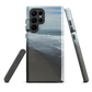 Phone case with a scenic photo of Riversdale Beach and ocean waves.