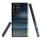 Dark abstract phone case with blue and grey streaks and glossy finish.