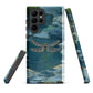 Nature-inspired phone case featuring a dragonfly over calm water with blue and green forest tones.
