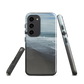 Phone case with a scenic photo of Riversdale Beach and ocean waves.