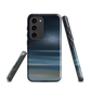 Dark abstract phone case with blue and grey streaks and glossy finish.