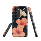 Phone case with coral hibiscus flowers and ivory blooms on dark background
