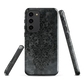 Dark damask patterned phone case with a vintage gothic aesthetic and textured stone background.
