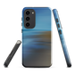 Ocean Breeze phone case with abstract blue and sandy tones inspired by sea and sky.