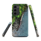 Resting Place phone case with aerial artwork of river rocks, green bush, and driftwood in a New Zealand stream.