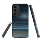 Dark abstract phone case with blue and grey streaks and glossy finish.
