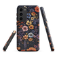 Phone case with colourful wildflowers on dark background, floral art design
