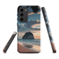 Phone case with Cathedral Cove beach and sunset scene, featuring soft skies and sea stack, by NZ artist Ben Hart.