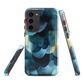 A modern abstract phone case featuring layered blue forms and soft flowing shapes.