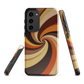 A retro-inspired phone case featuring warm swirling patterns in orange, yellow, and brown tones.