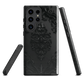 Black embossed damask phone case with gothic baroque pattern.