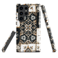 Moroccan tile pattern phone case in black, white, and gold tones with vintage-inspired design.
