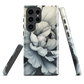 Black and white floral phone case featuring a soft, moody peony design by New Zealand artist Ben Hart.
