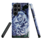 Designer phone case with a bold blue rose artwork and glossy finish.