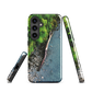 Resting Place phone case with aerial artwork of river rocks, green bush, and driftwood in a New Zealand stream.