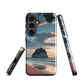 Phone case with Cathedral Cove beach and sunset scene, featuring soft skies and sea stack, by NZ artist Ben Hart.
