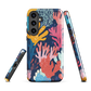 Colourful coral reef phone case design in pink, blue and yellow by NZ artist Ben Hart