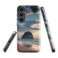 Phone case with Cathedral Cove beach and sunset scene, featuring soft skies and sea stack, by NZ artist Ben Hart.