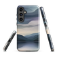 Phone case with moody blue and purple layered mountain and lake landscape artwork