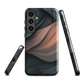 Phone case with flowing abstract design in black, copper and charcoal tones, inspired by dusk shadows