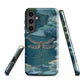 Nature-inspired phone case featuring a dragonfly over calm water with blue and green forest tones.