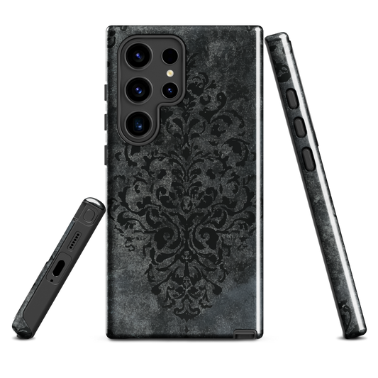 Dark damask patterned phone case with a vintage gothic aesthetic and textured stone background.