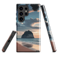 Phone case with Cathedral Cove beach and sunset scene, featuring soft skies and sea stack, by NZ artist Ben Hart.