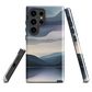 Phone case with moody blue and purple layered mountain and lake landscape artwork