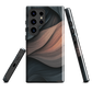 Phone case with flowing abstract design in black, copper and charcoal tones, inspired by dusk shadows