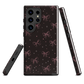 Midnight Bow seamless repeat pattern — pink hand-drawn ribbon bows and sparkle stars on a black background