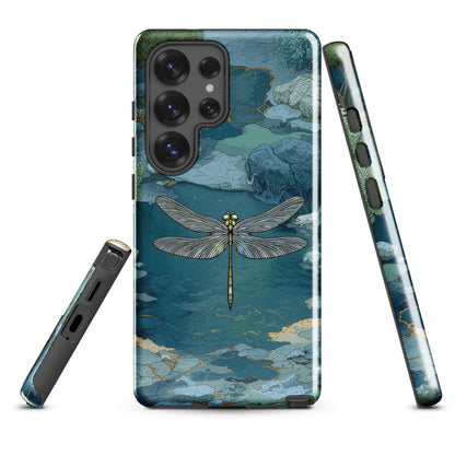 Nature-inspired phone case featuring a dragonfly over calm water with blue and green forest tones.